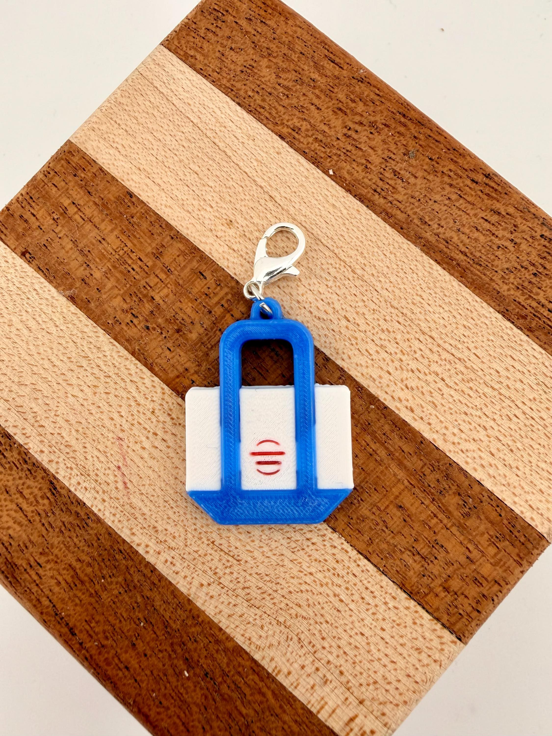 Funny badge reel charm Trader Joe's. tote Bag