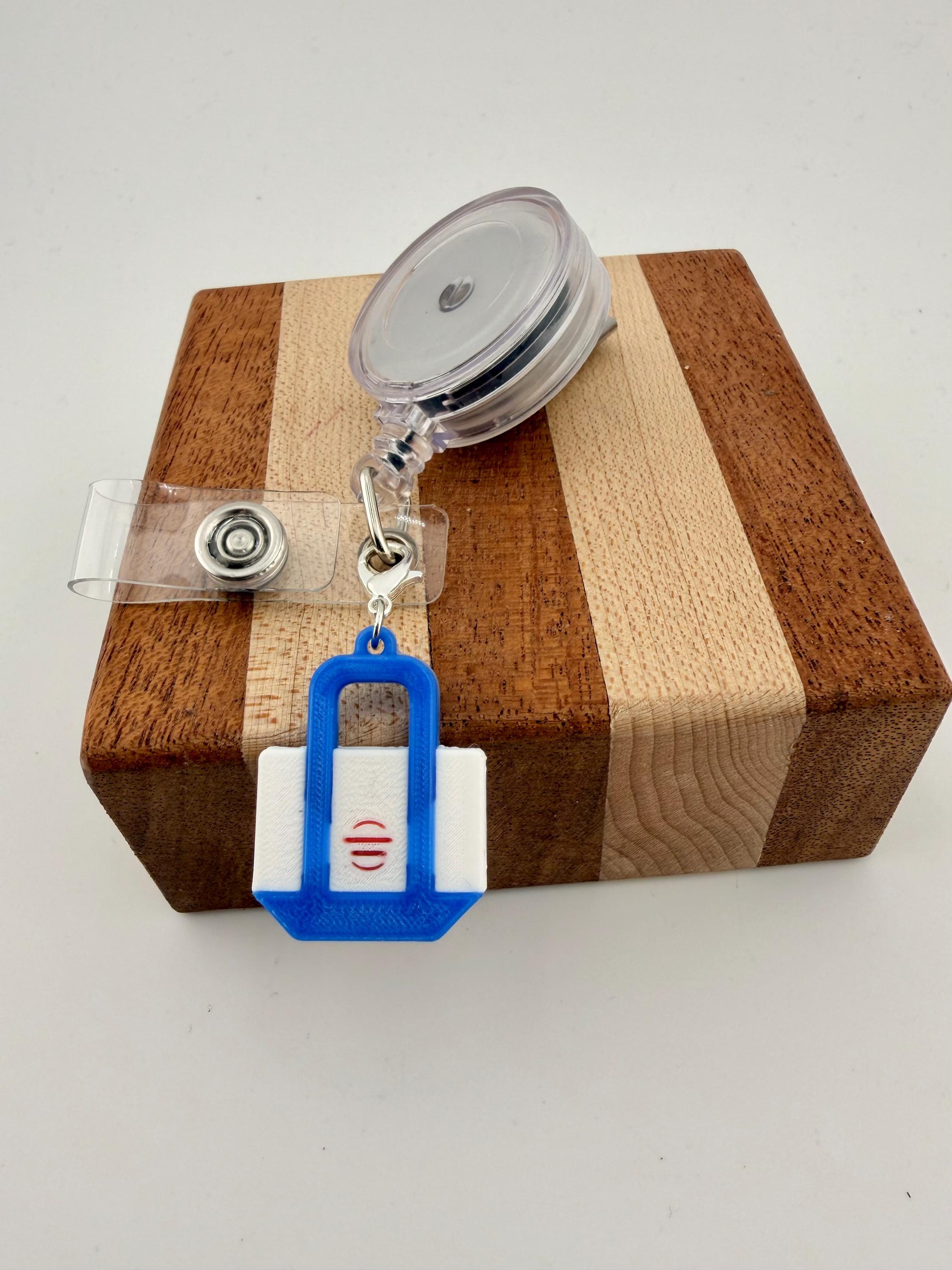 Funny badge reel charm Trader Joe's. tote Bag