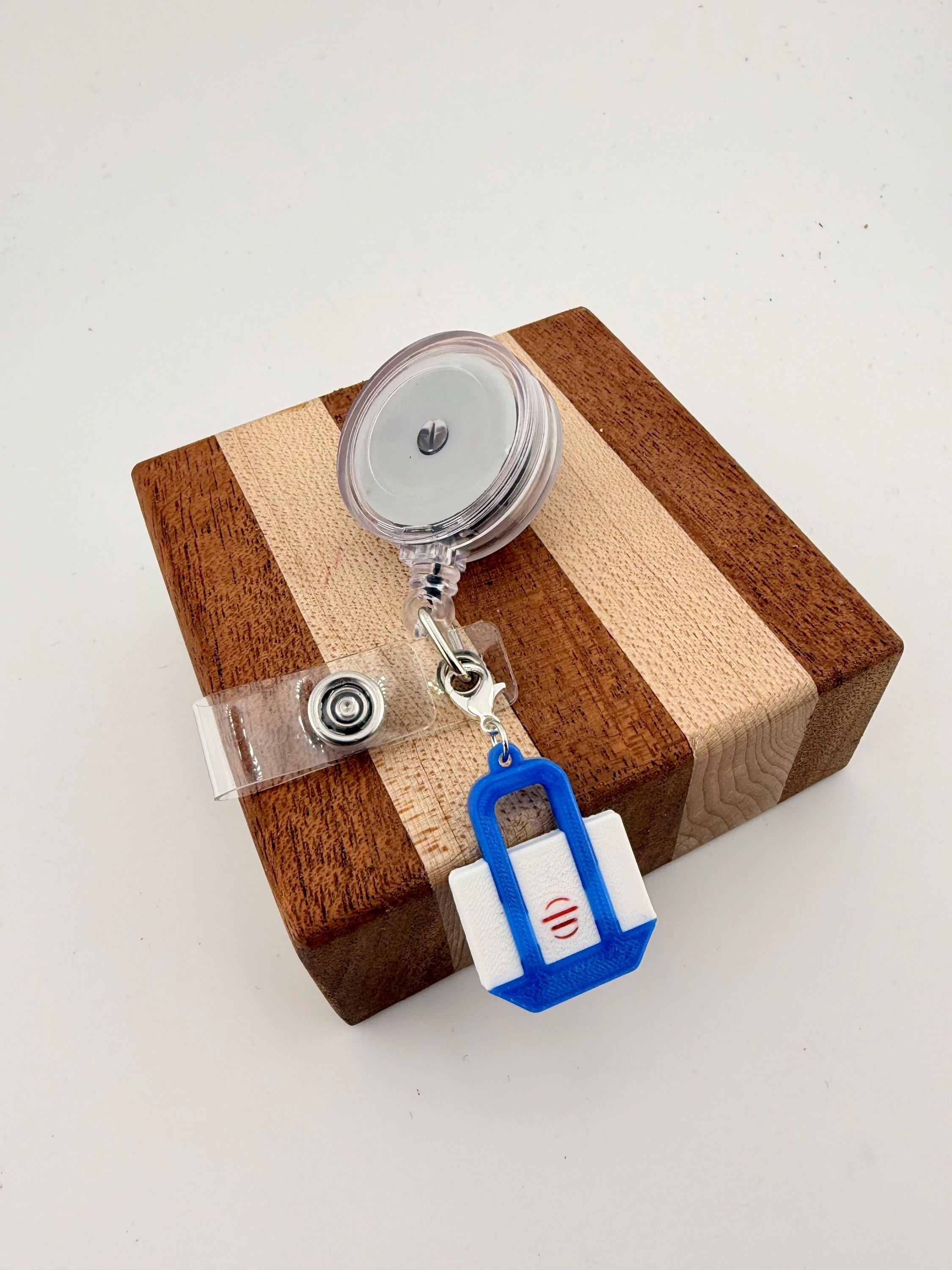 Funny badge reel charm Trader Joe's. tote Bag