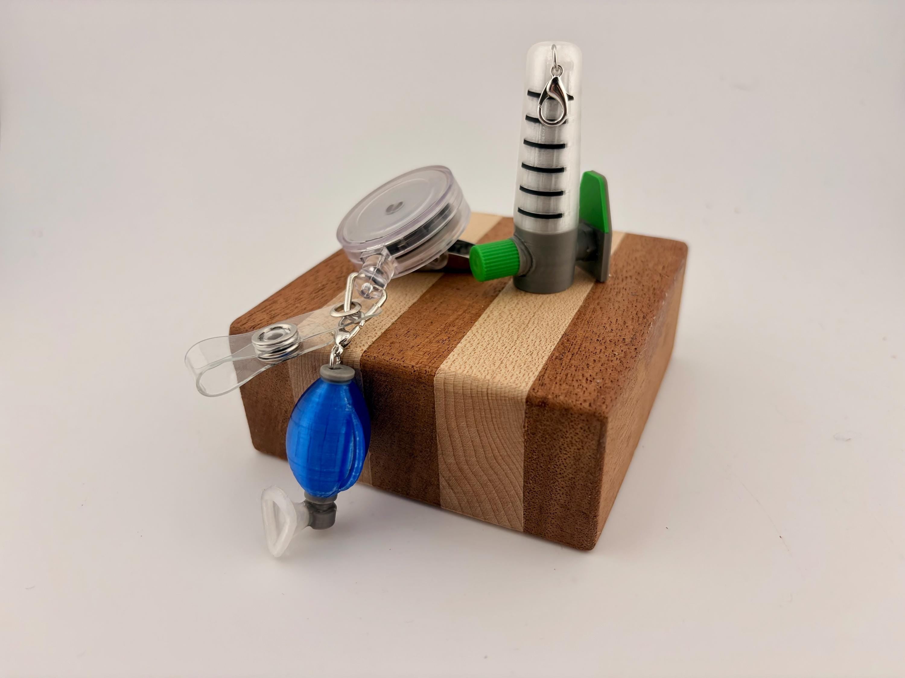 Funny nurse badge reel charms - Oxygen flowmeter and Ambubag Respiratory Therapy